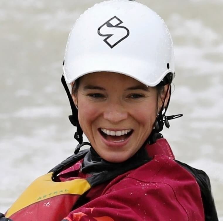 smiling woman on kayak